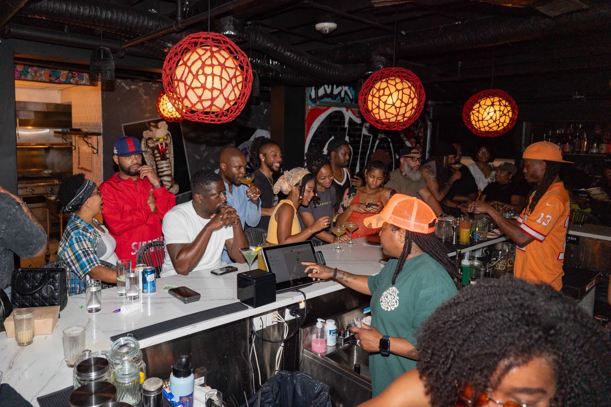 A full room of guests at the SULOD bar