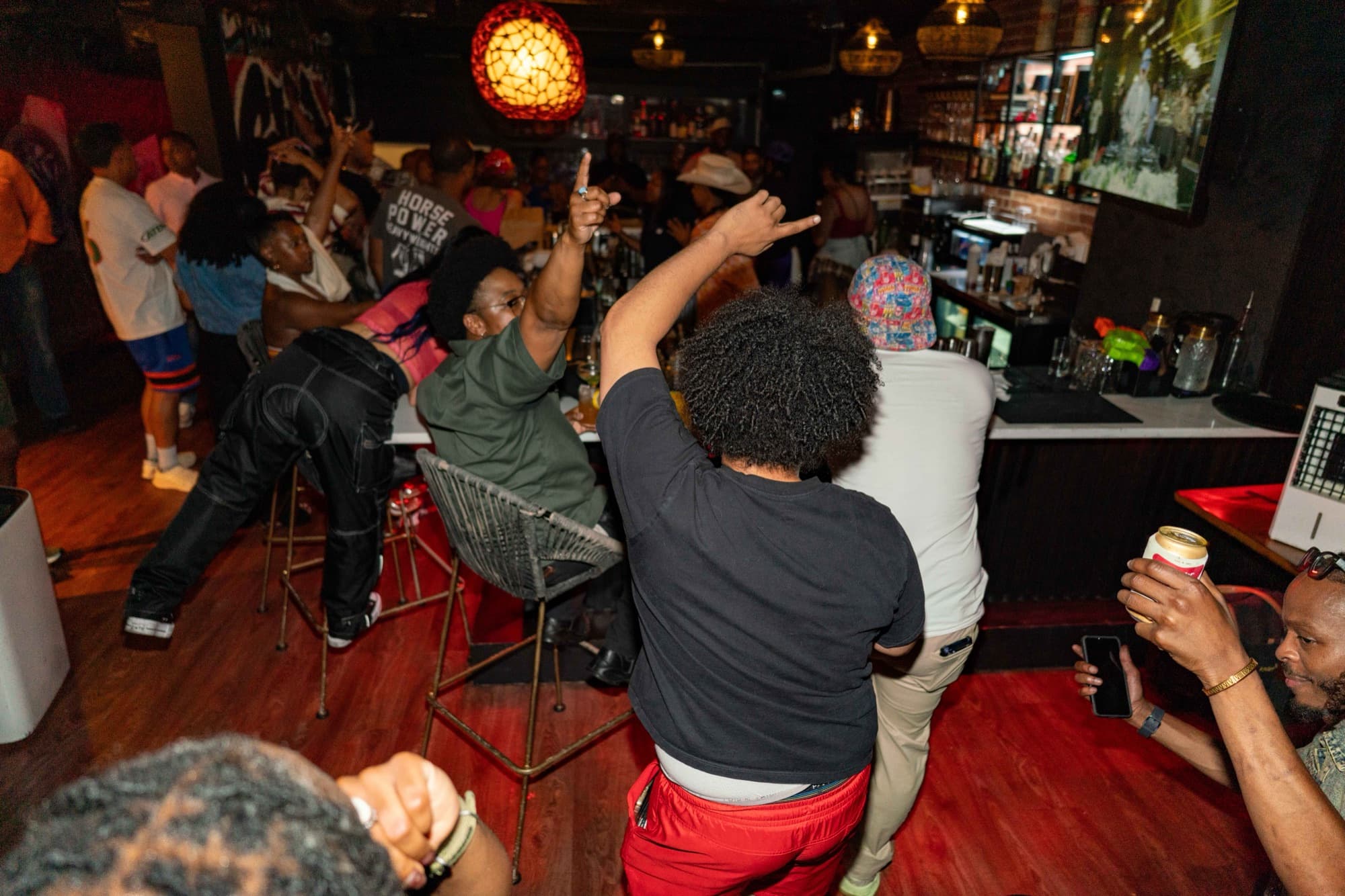 Hands up across the SULOD dance floor